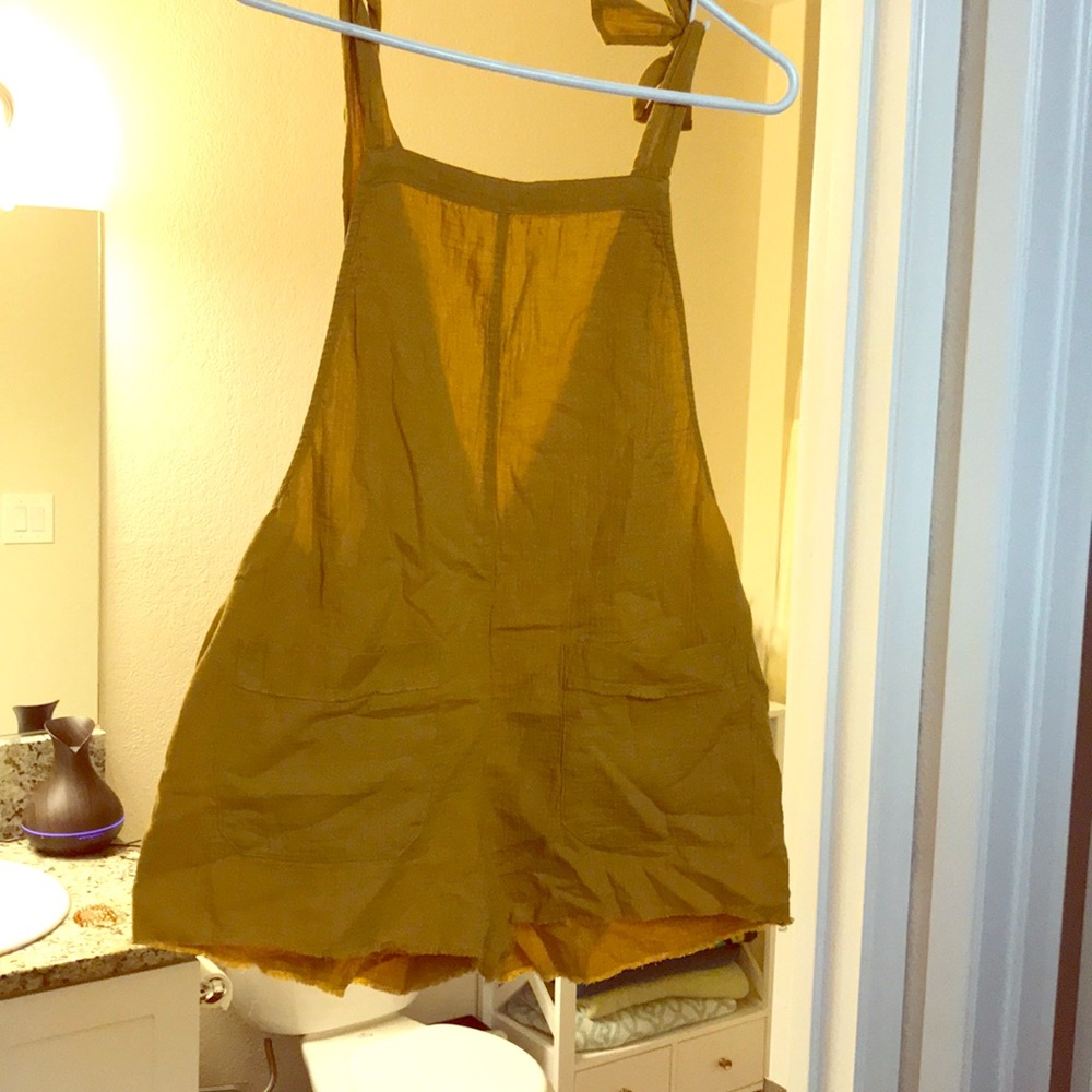 Trash bag romper with open back